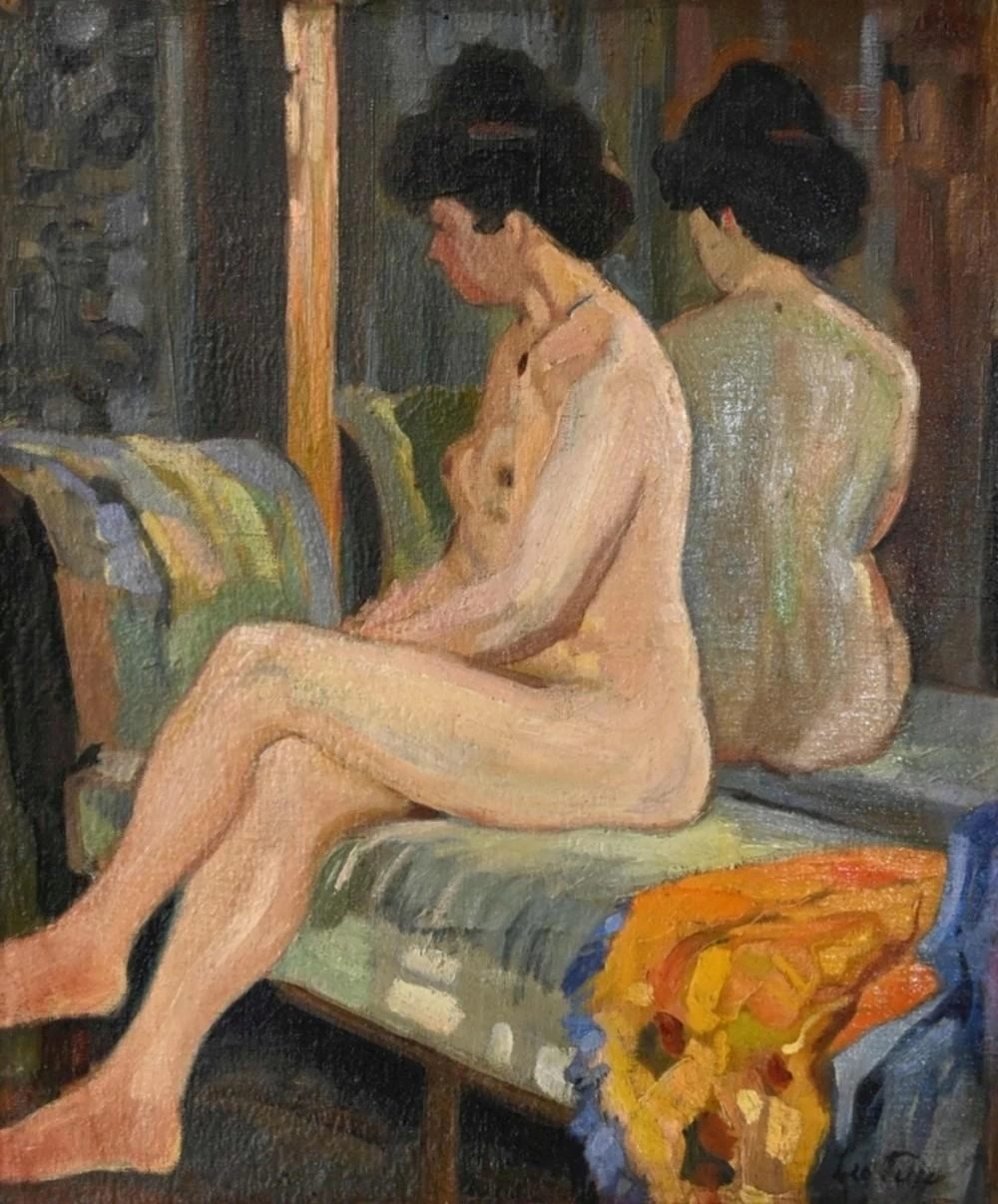Donna nuda seduta